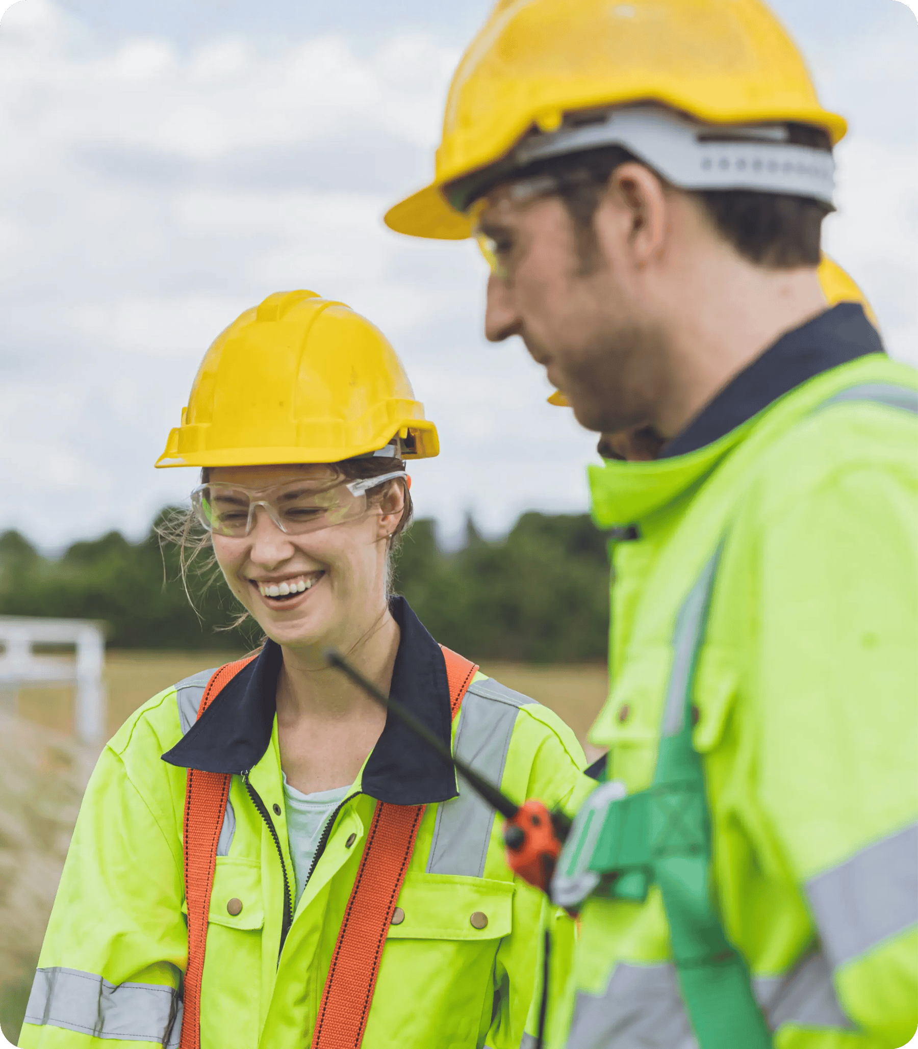 Engineers at a worksite demonstrating active compliance with safety standards and positive communication during National Safe Work Month Engineers at a worksite demonstrating active compliance with safety standards and positive communication during National Safe Work Month