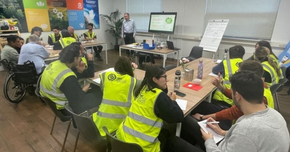 Jamie Toth of GYST holding a CareFactor session at Sims Lifecycle Services